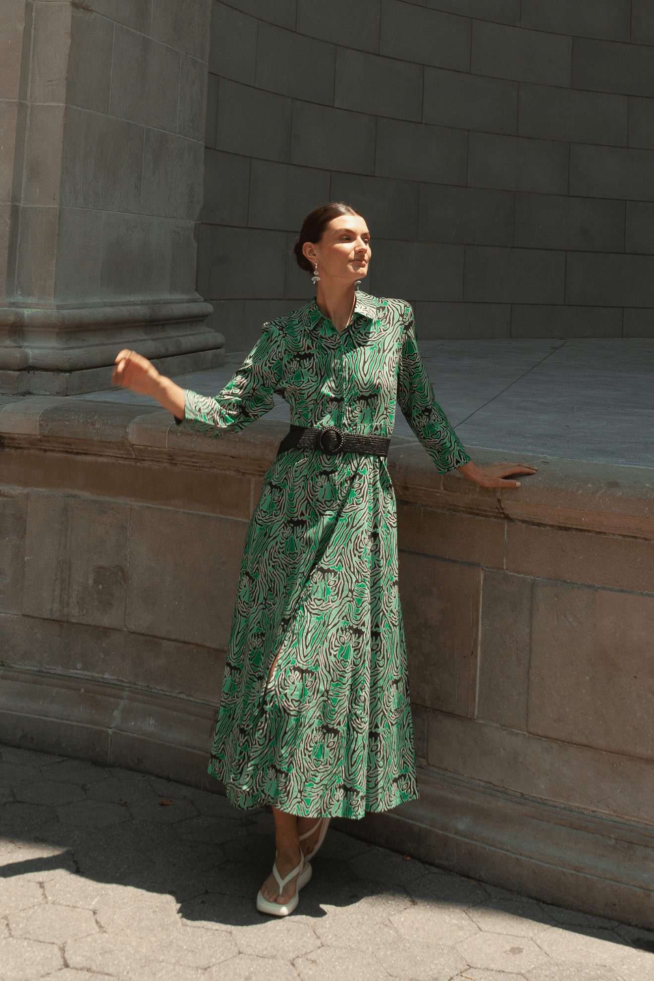 Model wearing a flowy floral print dress from Guadalupe Design.