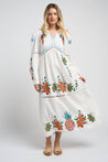 Model wearing the Sofia Parrot Dress